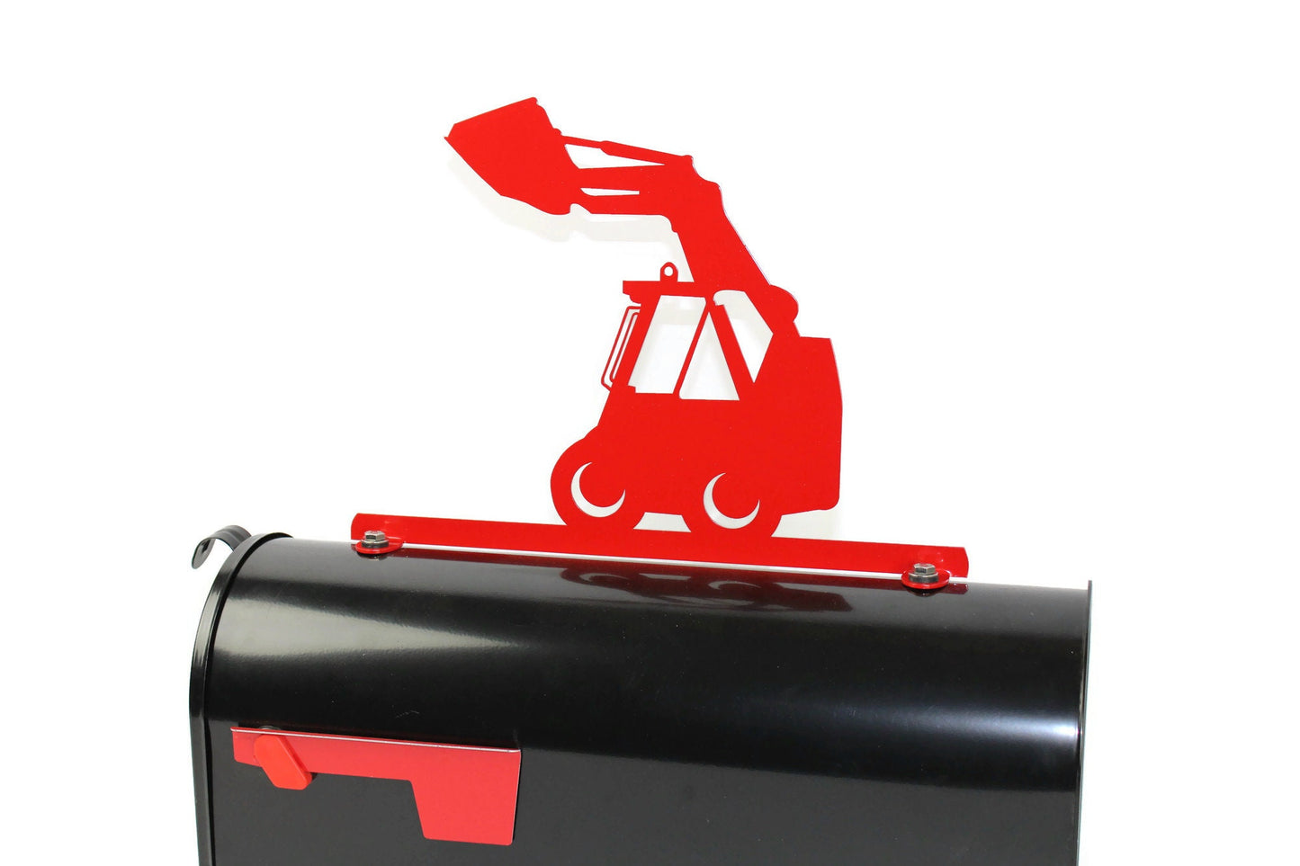 Red skid loader mailbox topper installed on a mailbox