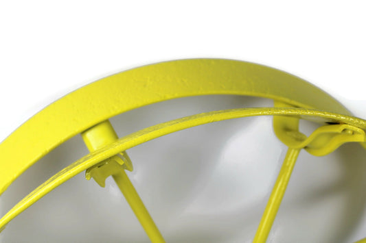 Yellow metal antique tractor planter wheel