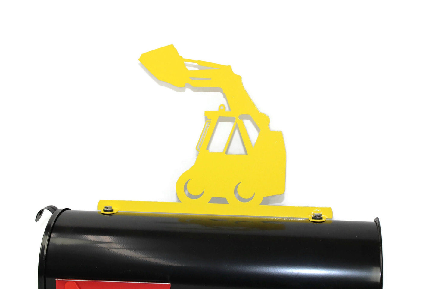 Yellow skid loader mailbox topper installed on a mailbox