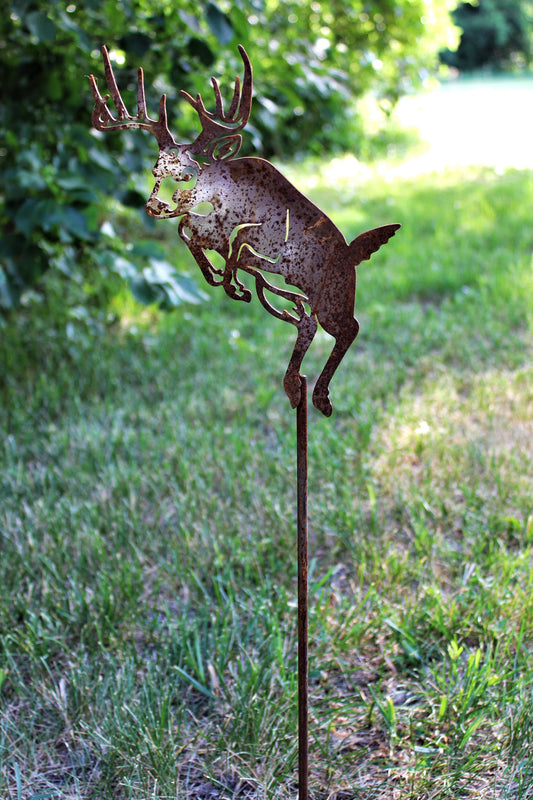 Rusty metal jumping deer garden stake