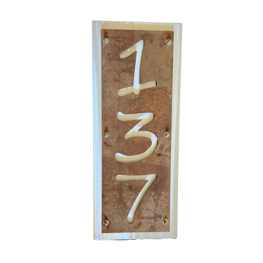 Rust over aluminum vertical layered metal address sign