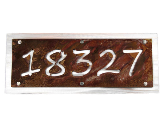 Rust over aluminum layered metal house address sign