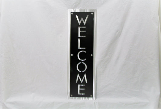 Black over aluminum vertical layered metal welcome sign
