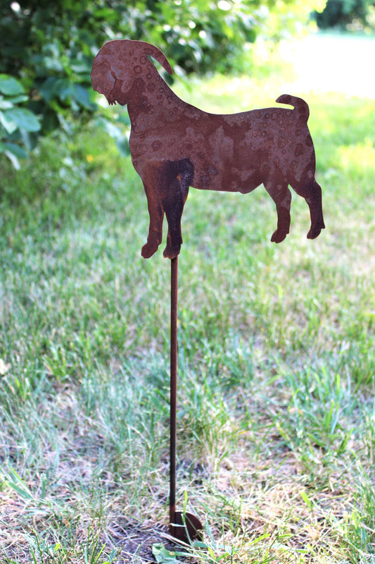 Rusty metal goat garden stake