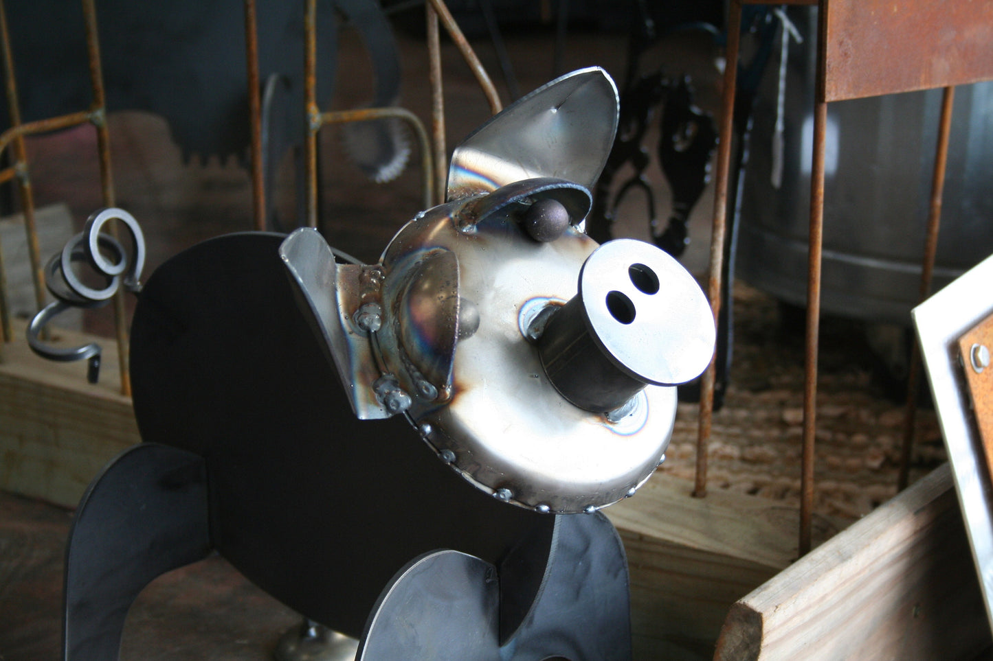 Raw steel pig garden statue with curly tail