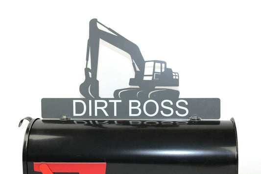 Dark gray excavator custom mailbox topper with name installed on a mailbox.