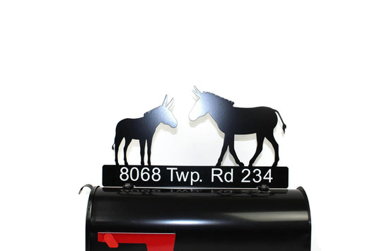 Black donkey custom mailbox topper with address installed on a mailbox