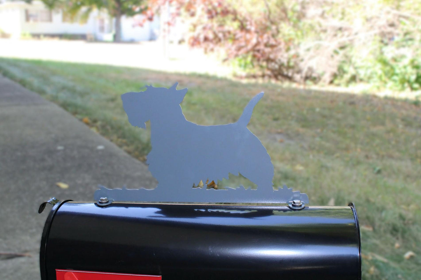 Gray Scottish Terrier mailbox topper installed on a mailbox