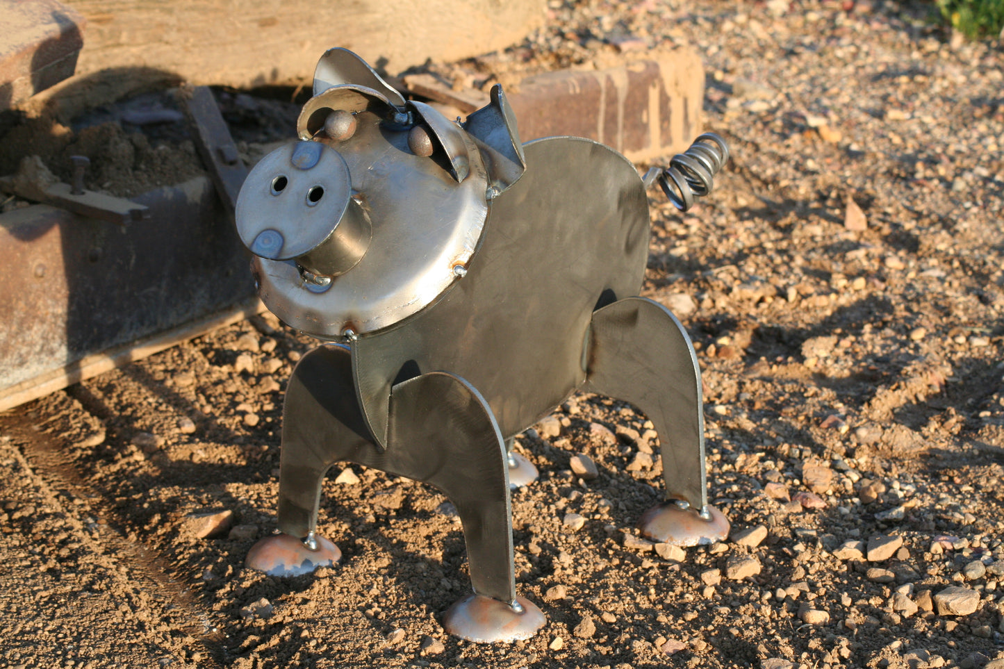 Raw steel pig garden statue with curly tail