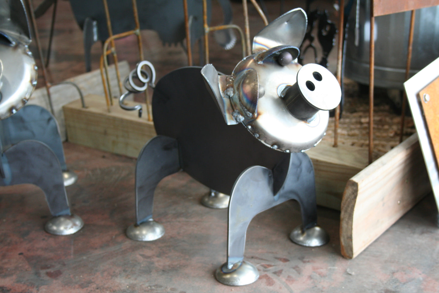Raw steel pig garden statue with curly tail