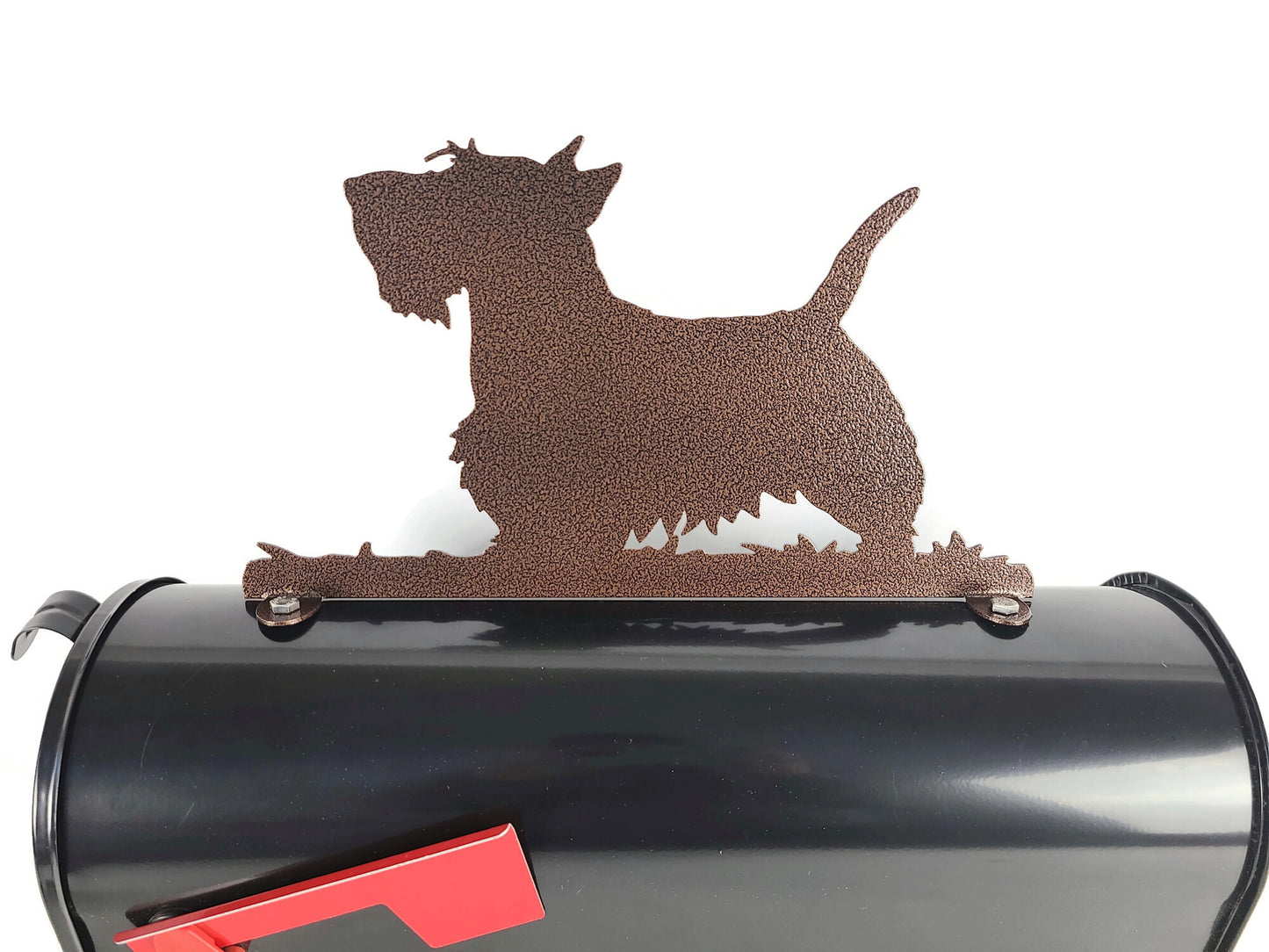 Copper Scottish Terrier mailbox topper installed on a mailbox