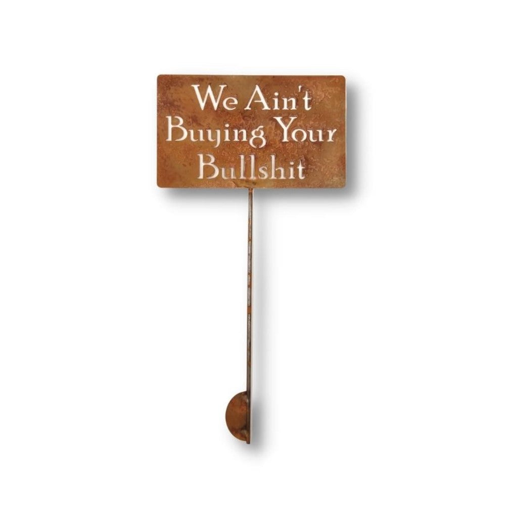 We Ain't Buying Your Bullshit rusty garden stake sign