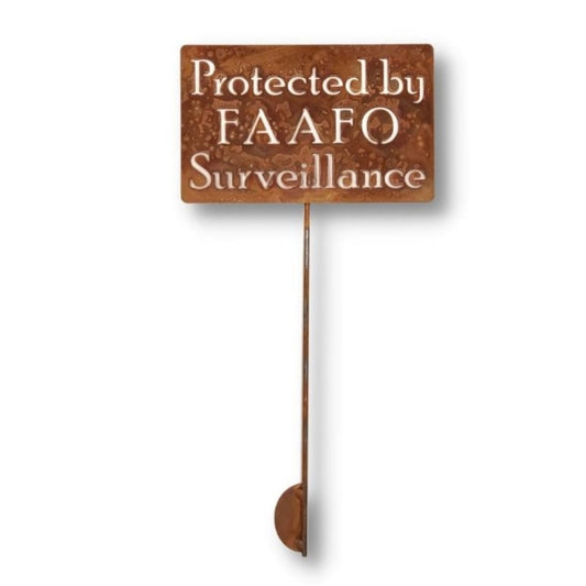 Protected By FAAFO Surveillance rusty garden stake sign