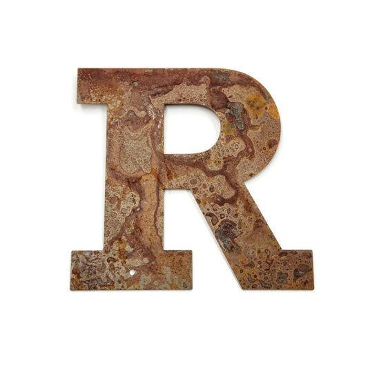 Metal letter R in rust