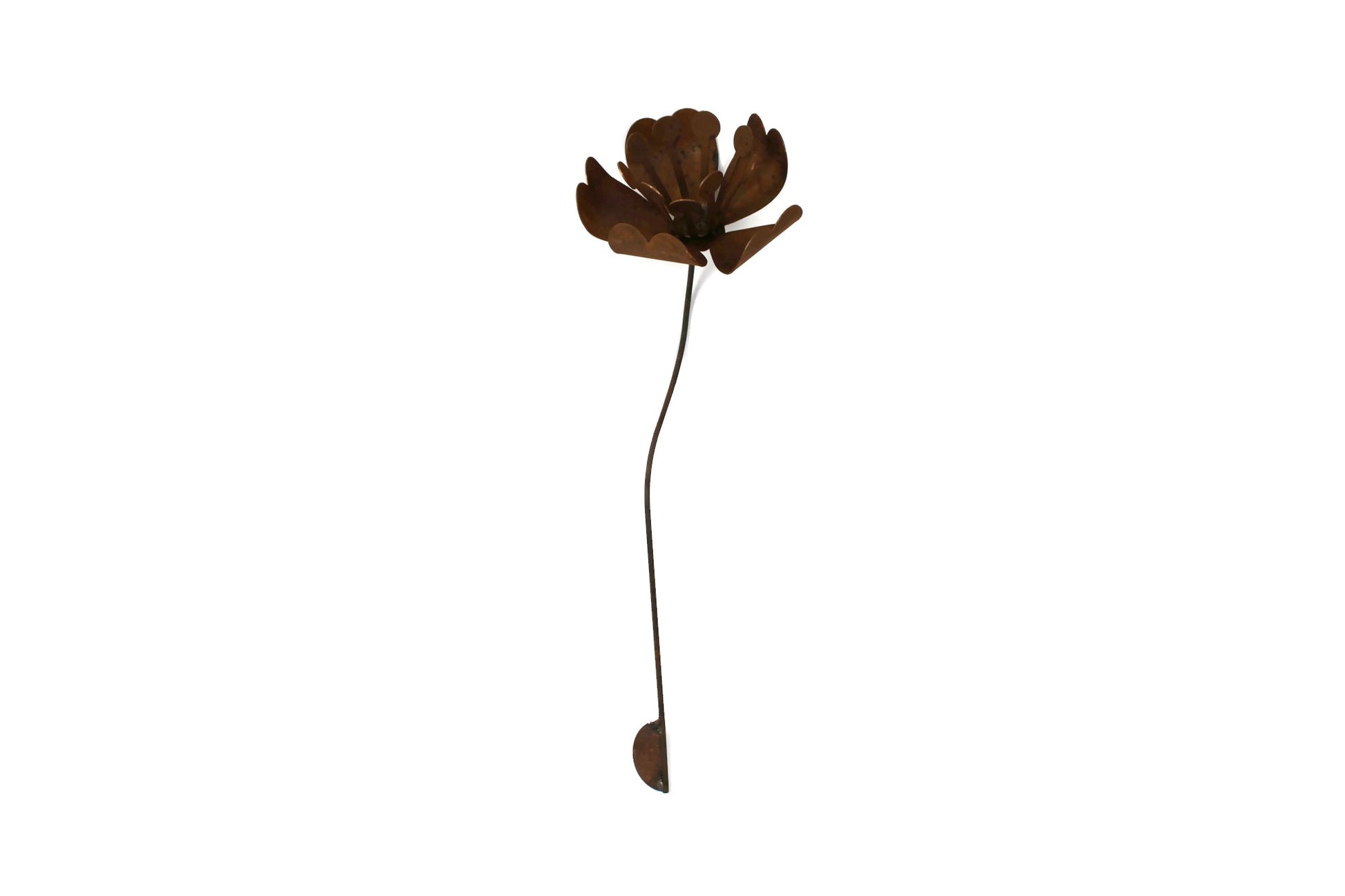 Daffodil and magnolia flower inspired rusty metal garden stake