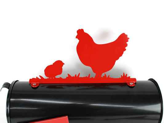 Red hen and chick mailbox topper installed on a mailbox.