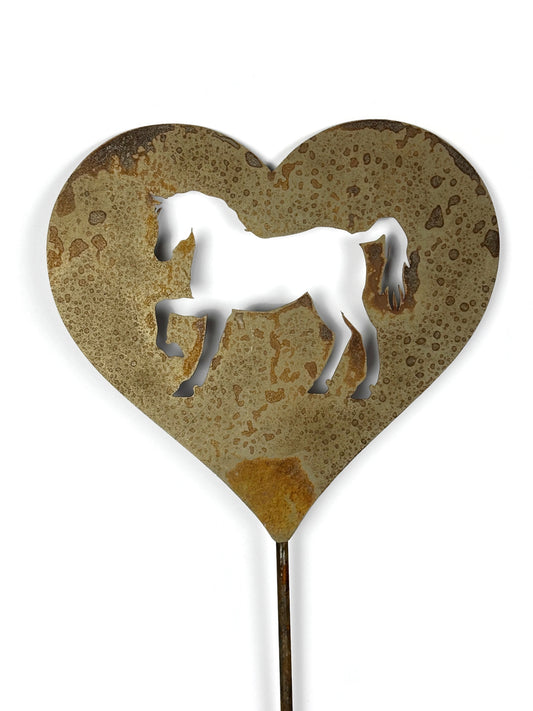 Metal heart shaped garden stake sign with a horse silhouette in rust