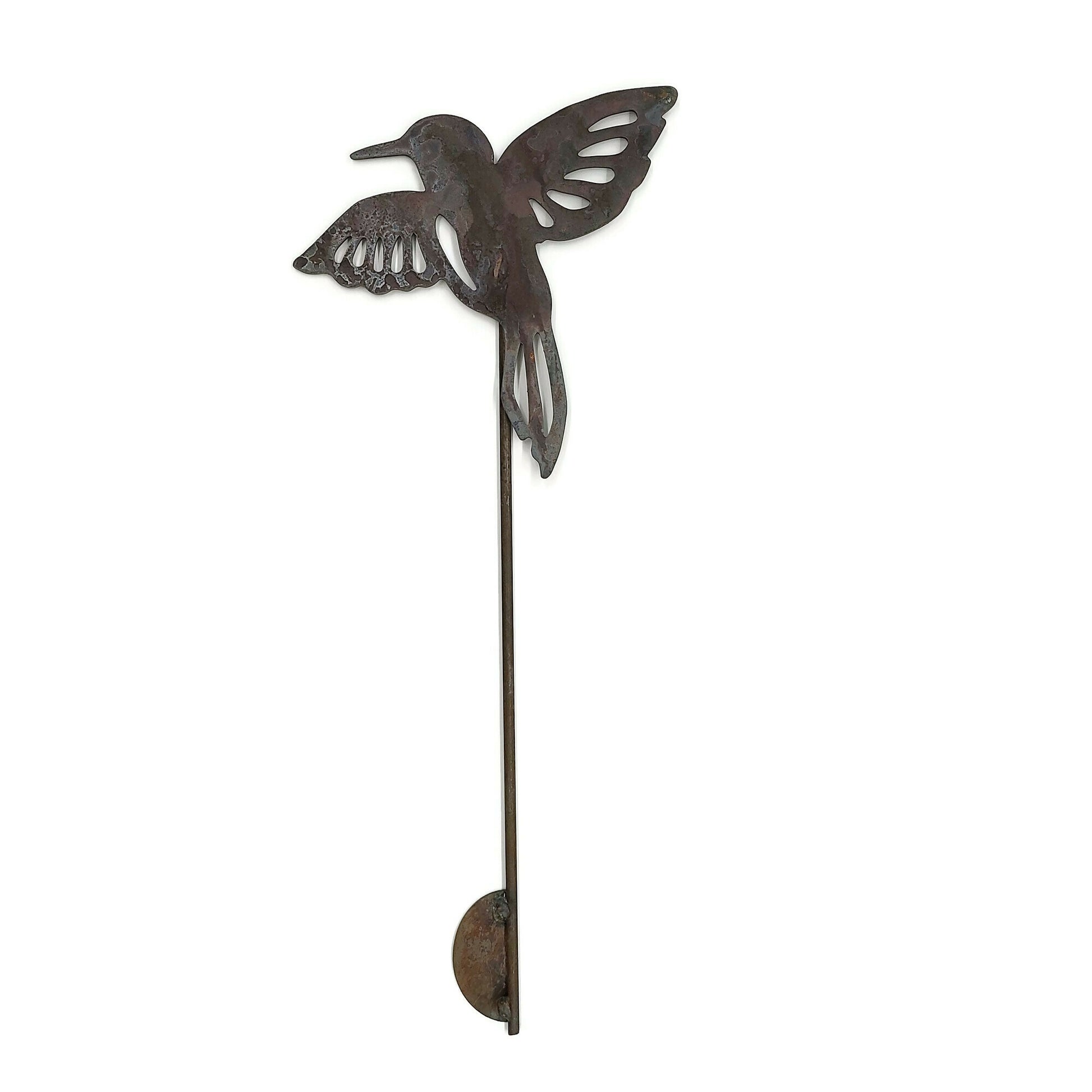 Metal hummingbird garden stake in rust