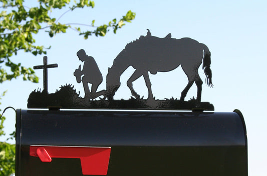Black praying cowboy with horse mailbox topper installed on a mailbox