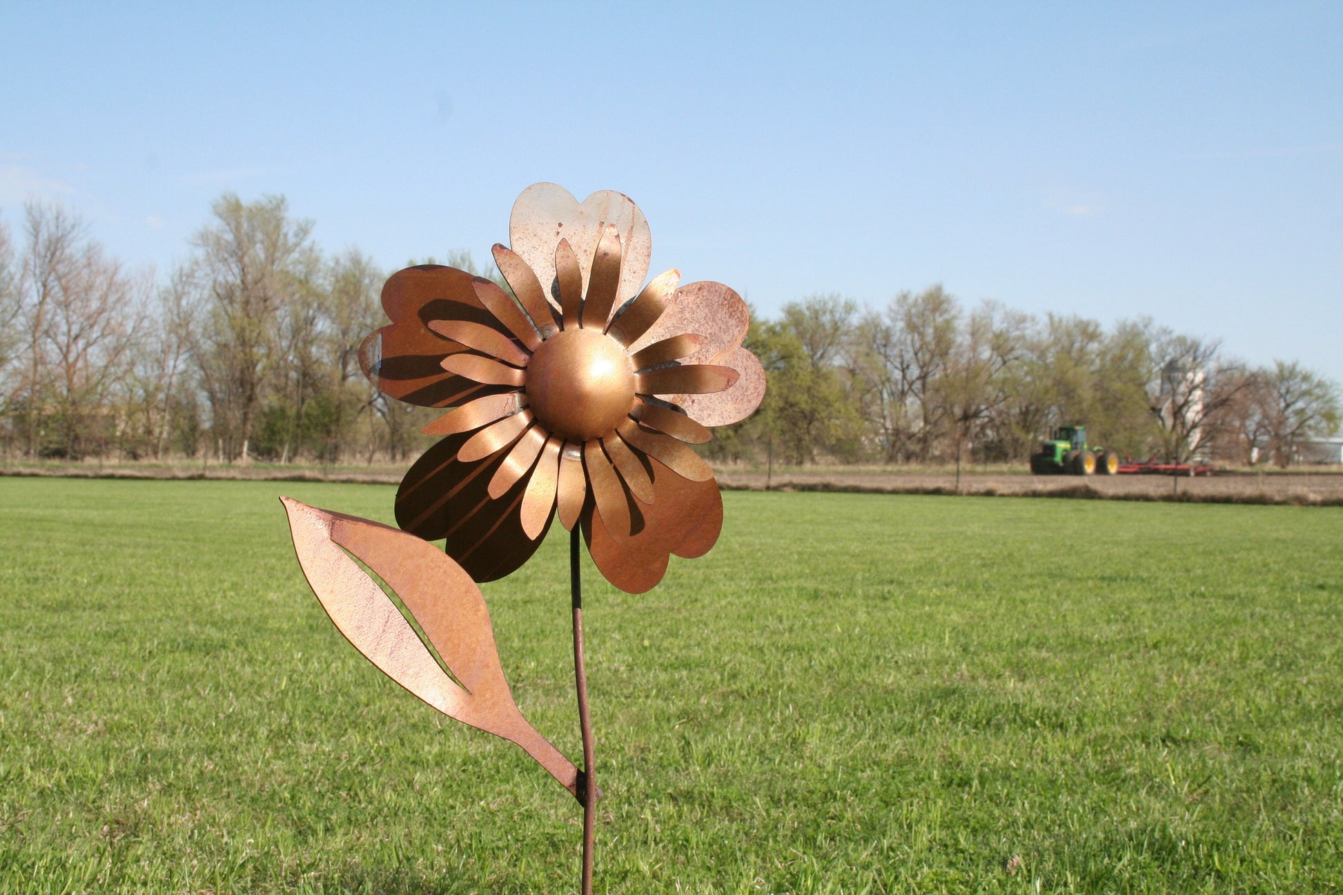 Rusty metal sunflower garden stake