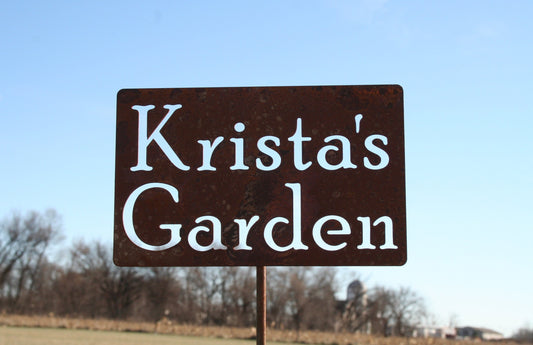 Custom metal garden stake in rust with Krista's Garden for text