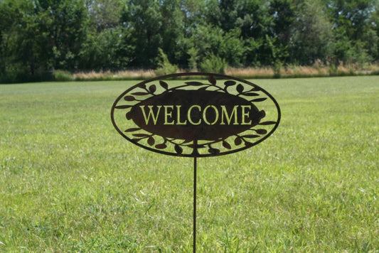 Rusty welcome leaf pattern metal garden stake
