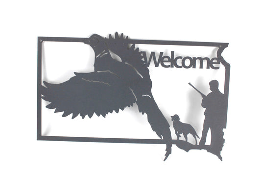 South Dakota shaped metal wall art with Welcome text, pheasant, hunter, and a dog in gray powder coat