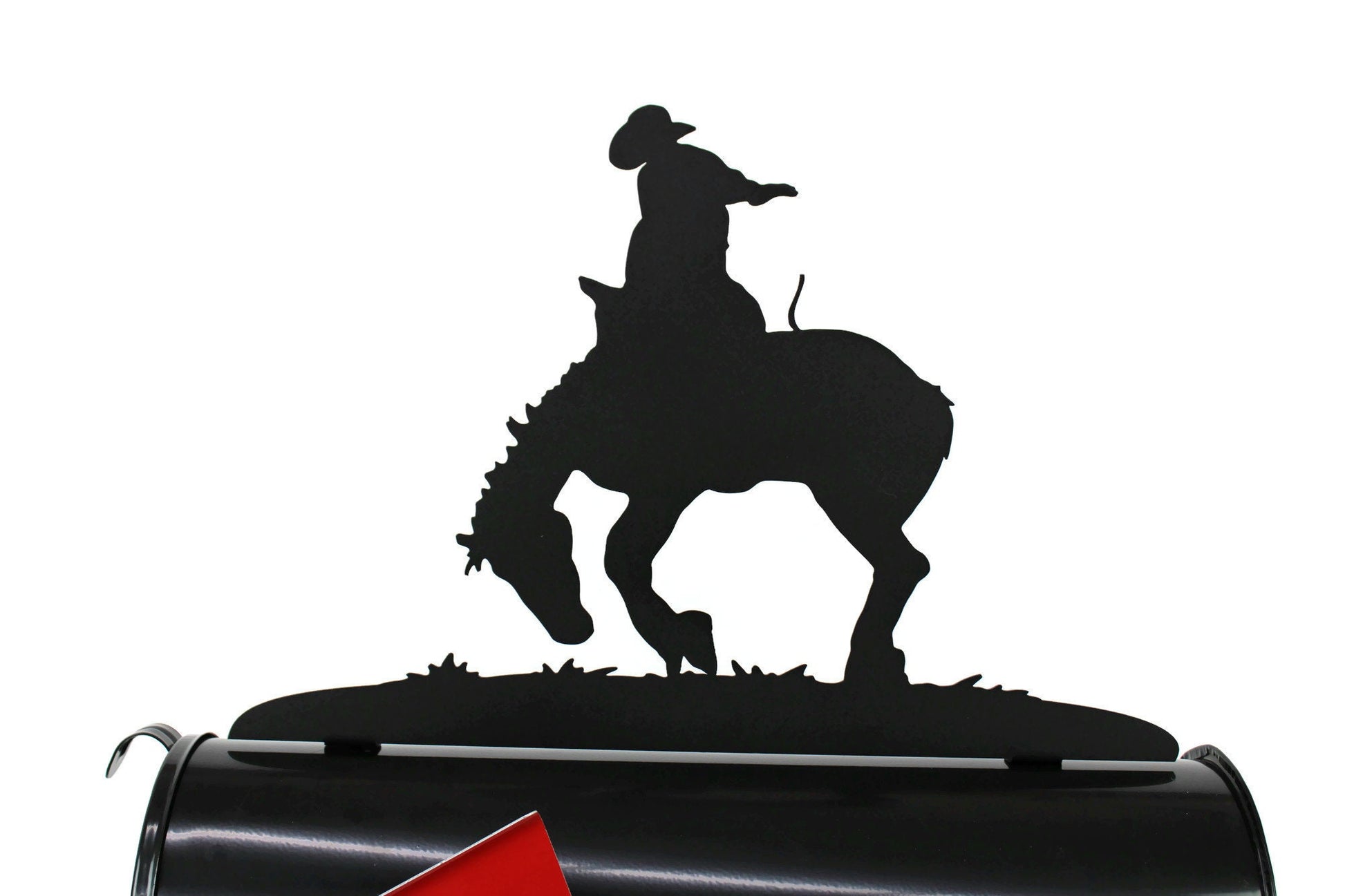 Black bucking rodeo bronco mailbox topper installed on a mailbox