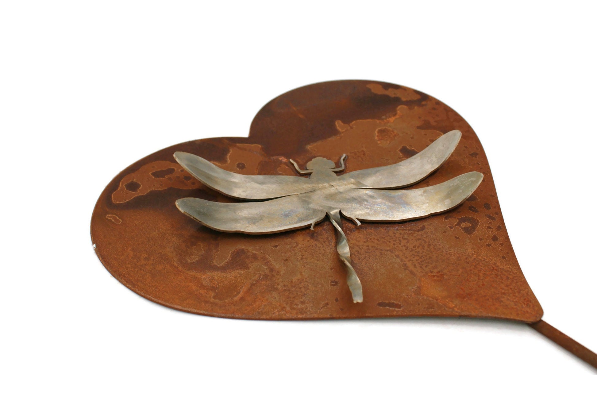 Rusty metal heart-shaped stake with stainless steel dragonfly garden stake