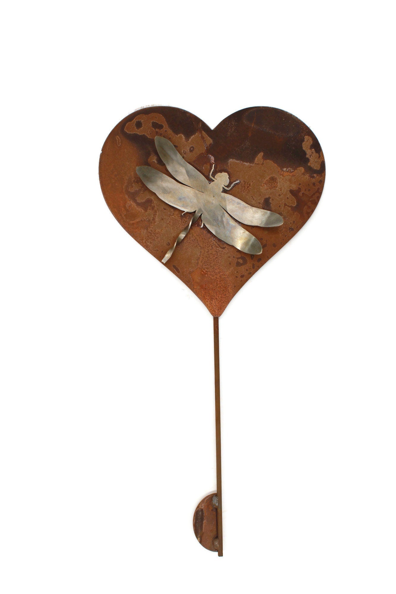Rusty metal heart-shaped stake with stainless steel dragonfly garden stake