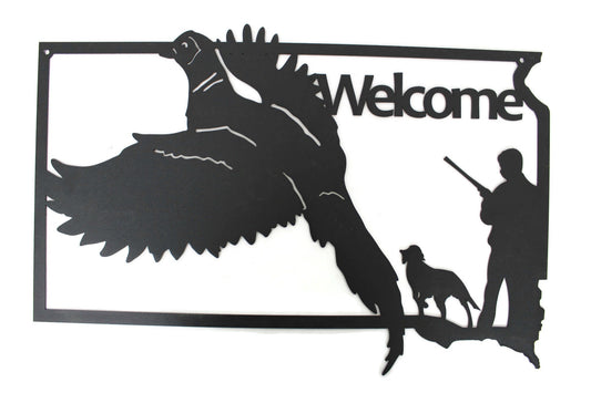 South Dakota shaped metal wall art with Welcome text, pheasant, hunter, and a dog in black powder coat