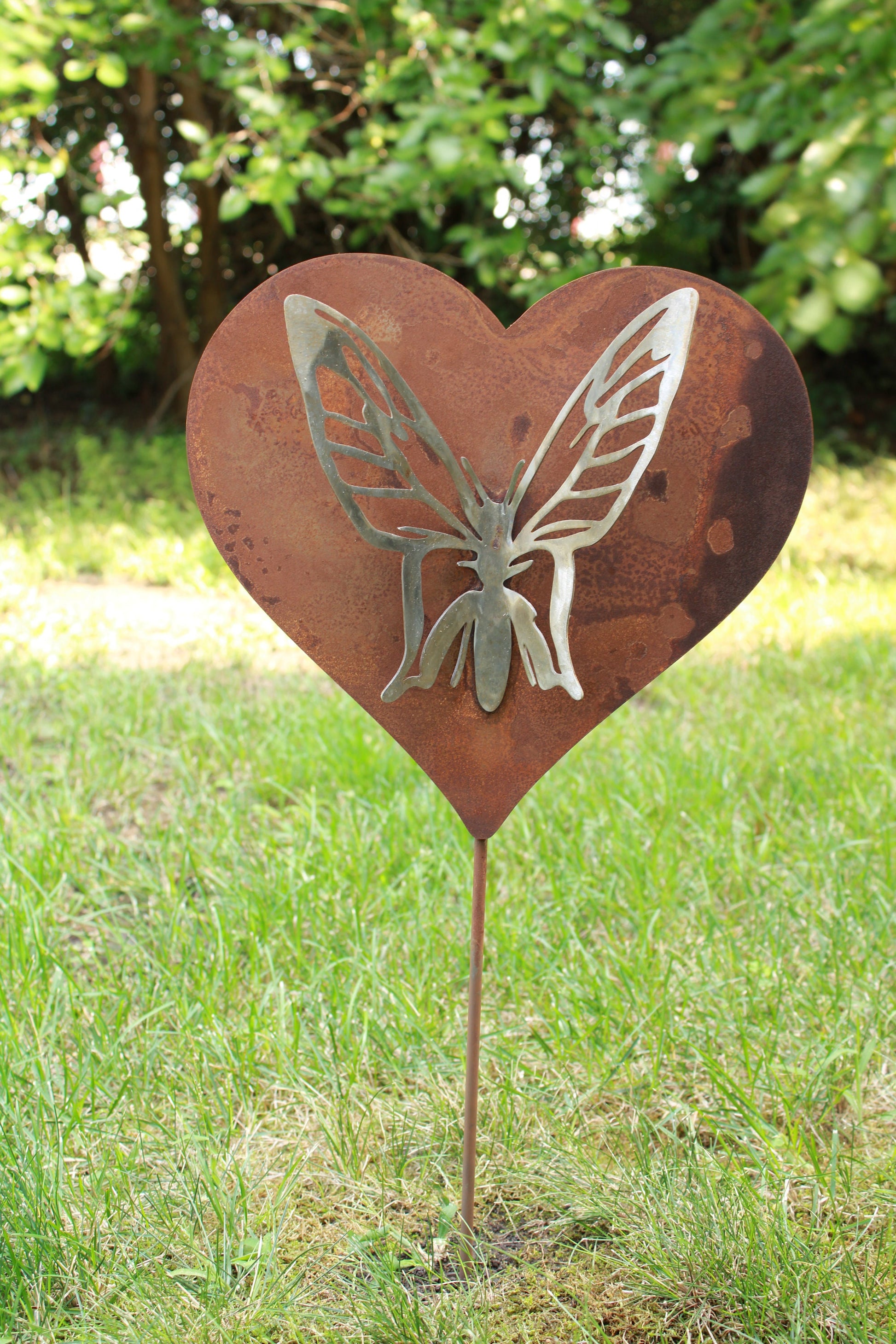 Rusty metal heart-shaped stake with stainless steel butterfly garden stake