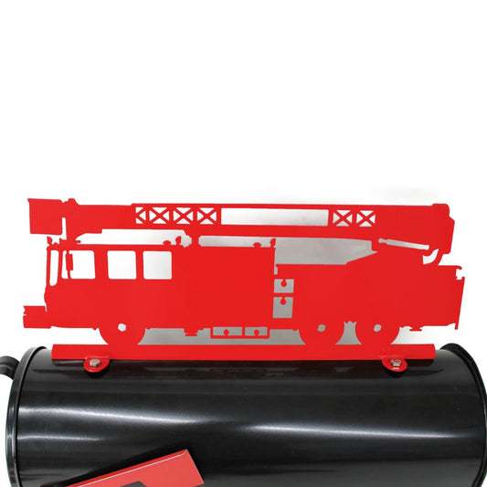 Red fire truck mailbox topper installed on a mailbox.