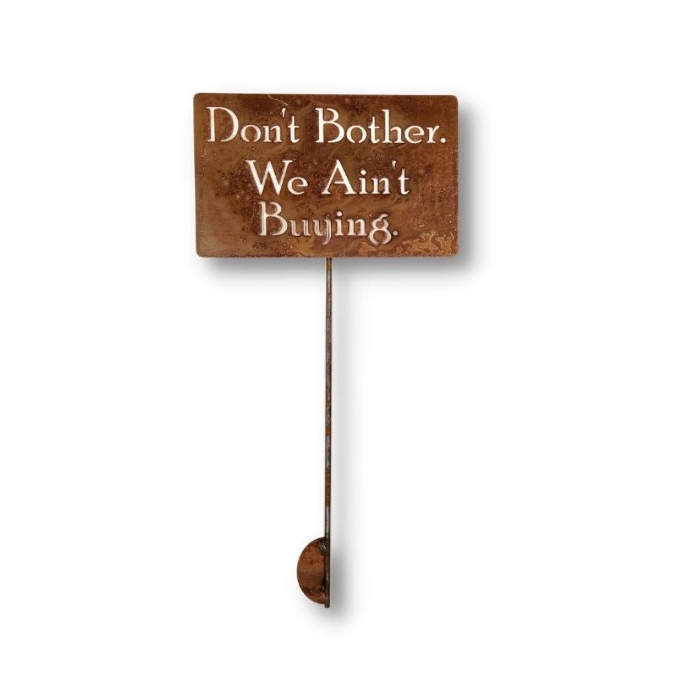 Don't Bother We Ain't Buying rusty garden stake sign