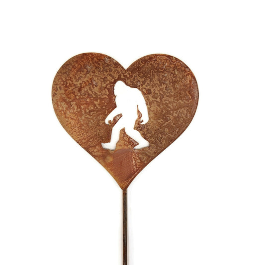 Heart-shaped sasquatch metal garden stake in rust