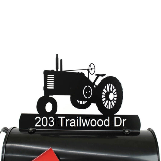 Black vintage tractor custom mailbox topper with address installed on a mailbox