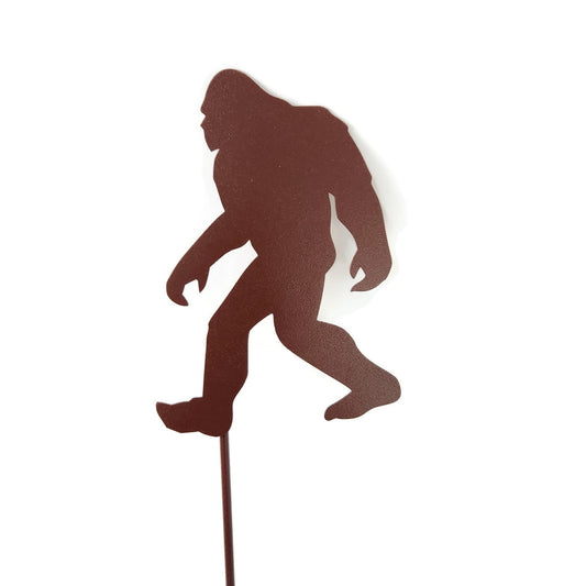 Walking sasquatch-shaped metal garden stake in hammered brown powder coat