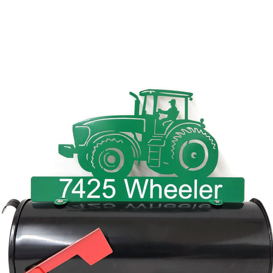 Green modern tractor custom mailbox topper with address installed on a mailbox