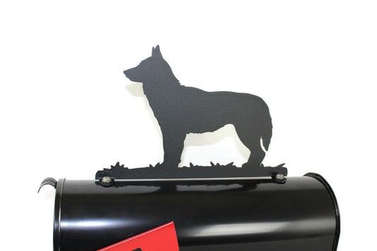 Black Siberian Husky mailbox topper installed on a mailbox