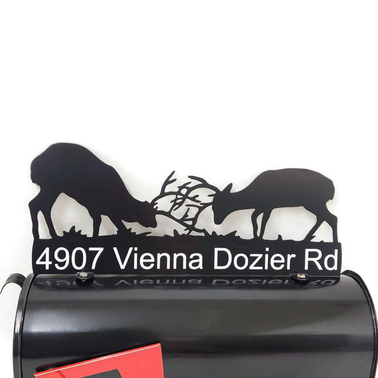 Black fighting deer custom milabox topper with address installed on a mailbox.
