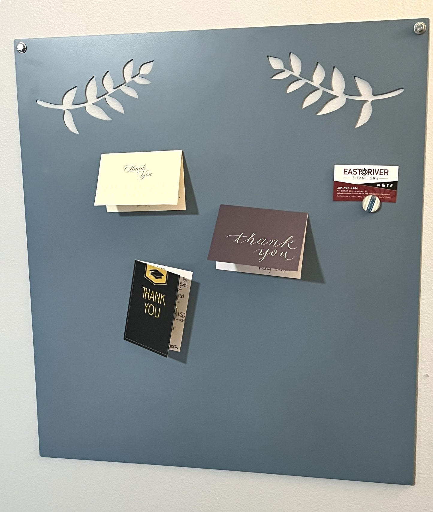 Light blue powder coat metal magnet message board with leaf pattern