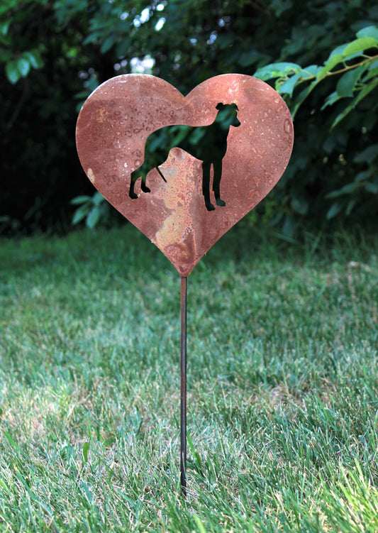Heart-shaped rusty garden stake sign in rust with a greyhound dog silhouette