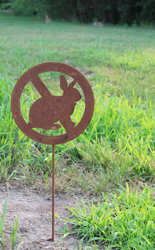 Rabbit with circle and line through it metal garden stake in rust