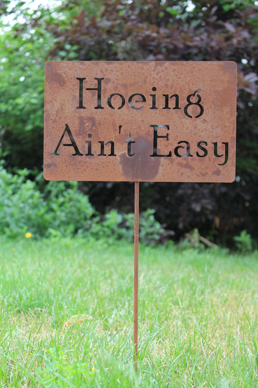 Hoeing Ain't Easy rusty garden stake sign