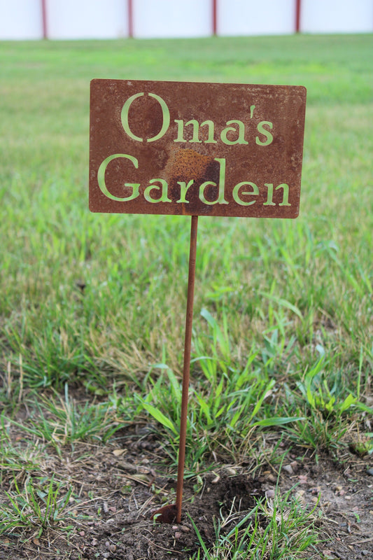 Oma's Garden rusty garden stake sign