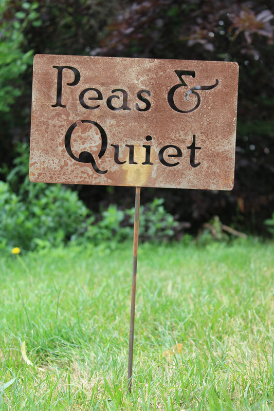 Peas and Quiet rusty garden stake sign