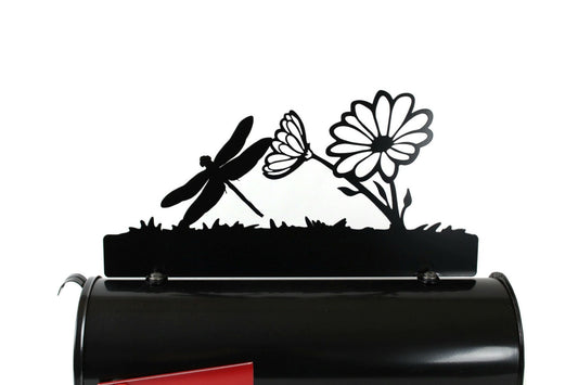 Black dragonfly and daisy custom mailbox topper installed on a mailbox.