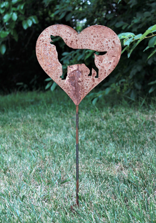 Heart-shaped rusty garden stake sign in rust with a labrador dog silhouette