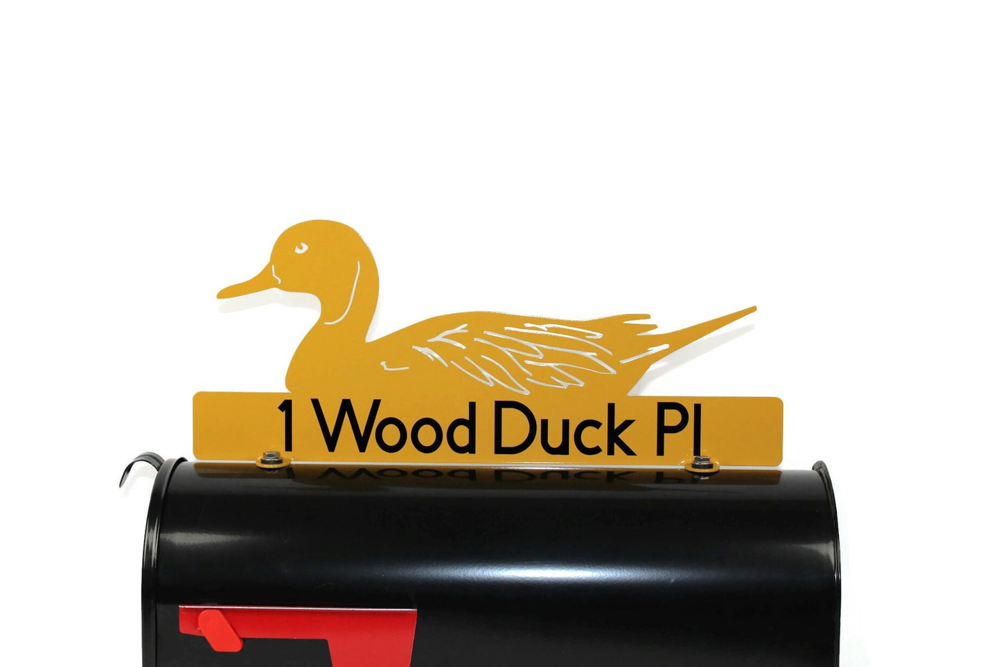 Dark yellow mallard duck custom mailbox topper with address installed on a mailbox