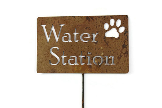 water station with paw rusty garden stake sign